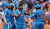 Captain Rohit doffs his hat to the Indian bowlers