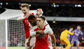 EPL PIX: Arsenal upset Liverpool; Man United win