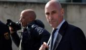 Spanish court slaps ex-soccer coach with fine over kiss