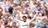 Gill's father 'proud' after double ton but...