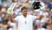PIX: Root's century powers England to huge lead