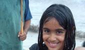 Unusual monsoon pics: Cradling a baby turtle!