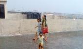 Unusual monsoon pics: Making of childhood memories