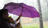 Unusual monsoon pics: Father, child and nature