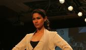 IMAGES: Lotus lovelies float onto the runway