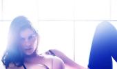 PICS: Laetitia Casta stuns in new lingerie campaign!