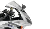 How are disc brakes different from drum brakes