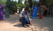 She catches snakes to save them