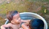 Your summer pics: Kids in a tub