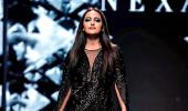 Incredibly HOT! Sona scorches runway in a black slit dress