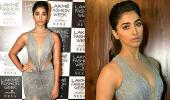 Pix: Pooja flaunts her curves in sheer and silver