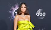 Selena Gomez puts curves on display in a mini dress