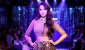 Don't miss! Nora bares midriff in a bronze lehenga