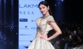 Does Divya Khosla remind you of a Barbie doll?