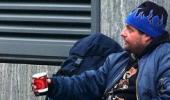 UK: Begging helps professionals beat recession