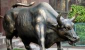 Sensex ends down 220 points at 16,877