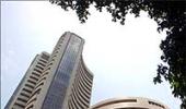 Sensex ends near day's high