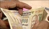 Kores plans fake money detector unit in India