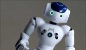 Technology: 3 robots and a soccer team