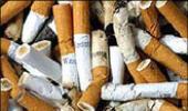 Australia imposes tough rules on cigarette firms