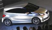 Honda unveils small concept car, launch in 2011