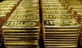 RBI further tightens gold import rules to tame demand
