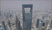 China's GDP growth slows, but beats expectations