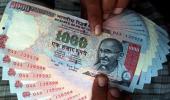 Rupee ends 3 paise lower at 63.58 against dollar