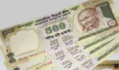 Rupee falls to 52.15 per dollar