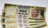 Rupee up 18 paise at 55.47 against dollar