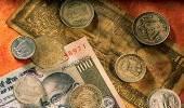 Rupee ends 2 paise down at 54.48