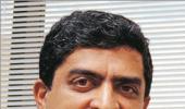 Nilekani team moots ATMs for payments via Aadhaar