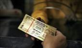 Rupee closes 26 paise higher at 66.22 against USD