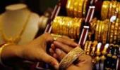 Gold loses Rs 140; silver gains Rs 175