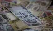 Rupee gains sharply by 71 paise against dollar