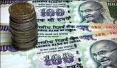 Rupee gains 23 paise vs dollar