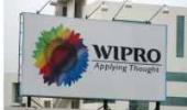 Wipro promoters to cut stake via auction