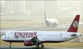 Kingfisher cuts more flights, Mallya to meet pilots