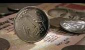 Rupee gains 60 paise vs dollar in early trade