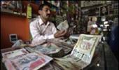 Rupee slide: RBI steps in