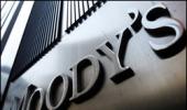 Moody's downgrades LIC, 3 banks