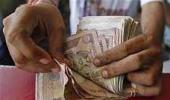 Rupee down 27 paise against dollar in morning trade