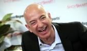 Tax rules could force Bezos to play active role at WaPo