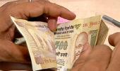 Why NRIs are happy that rupee is sinking