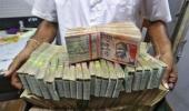 Rupee trims initial gains Vs dollar; still up 32 paise