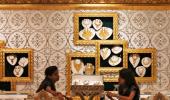 India to retain gold import curbs despite easing trade gap