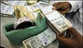 Rupee up by 24 paise vs dollar in late morning trade