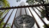 Weak rupee, high inflation force RBI to hold rates