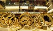 Gold falls on global cues; silver ends steady