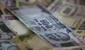 Rupee hits all-time low, ends below 60 versus dollar